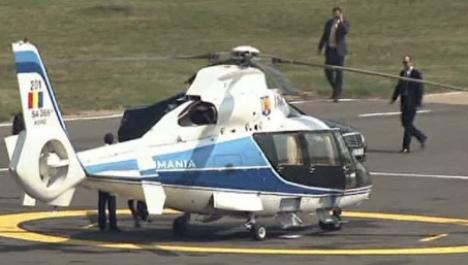 Ţara arde şi Boc îşi plimbă familia cu elicopterul SRI (VIDEO)